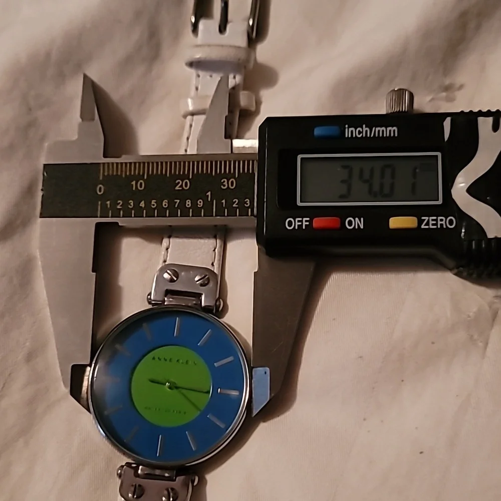 Anne Klein 10/9987 White Genuine Leather Band‎ Blue-Green Dial Women's Watch
